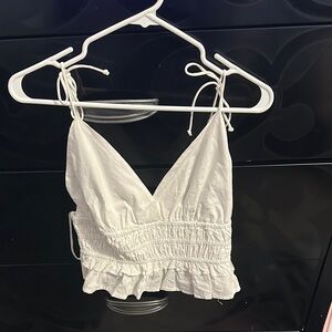 White Women's Top with Ruffle Hem